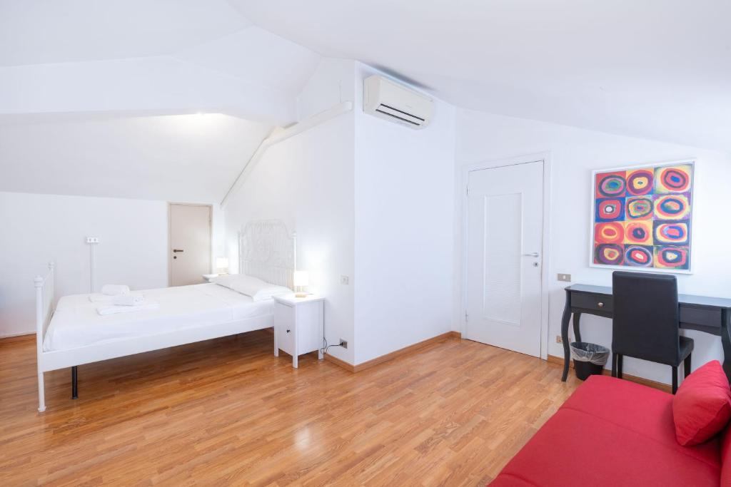 Postel nebo postele na pokoji v ubytování Cittadella Suite