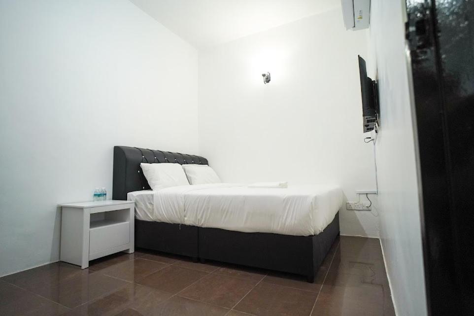 Postel nebo postele na pokoji v ubytování B Link Hotel