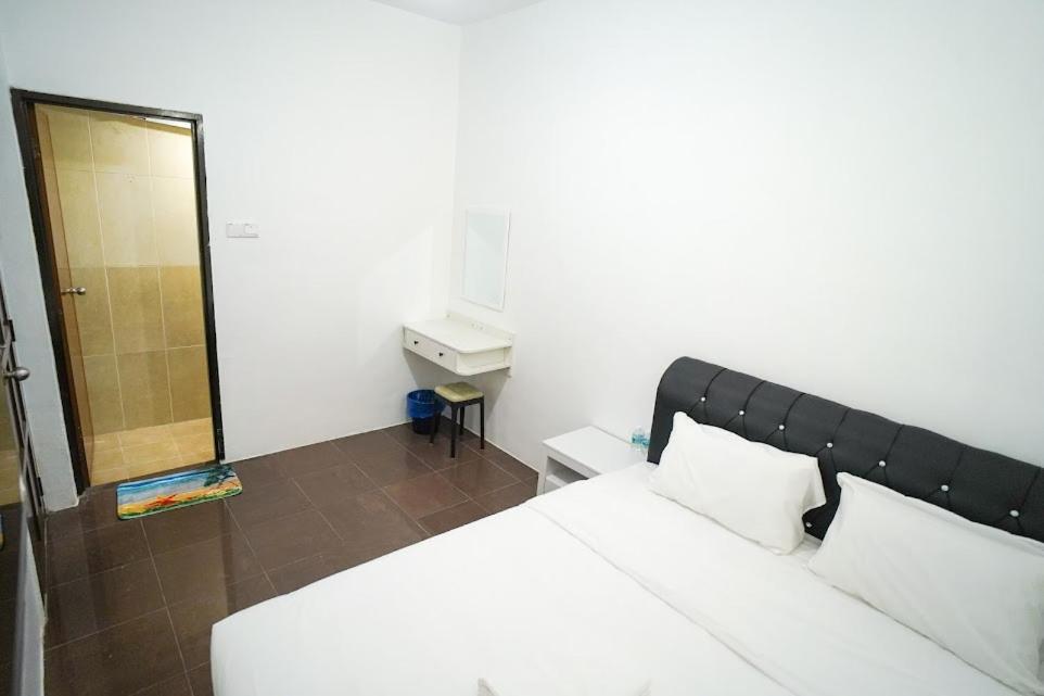 Postel nebo postele na pokoji v ubytování B Link Hotel