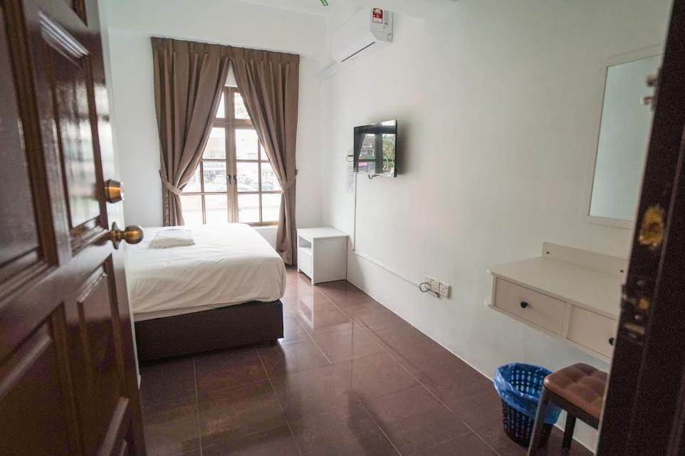 Postel nebo postele na pokoji v ubytování B Link Hotel