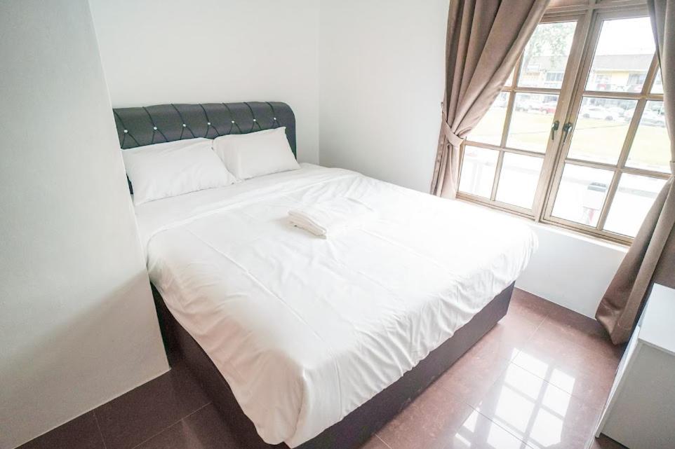 Postel nebo postele na pokoji v ubytování B Link Hotel