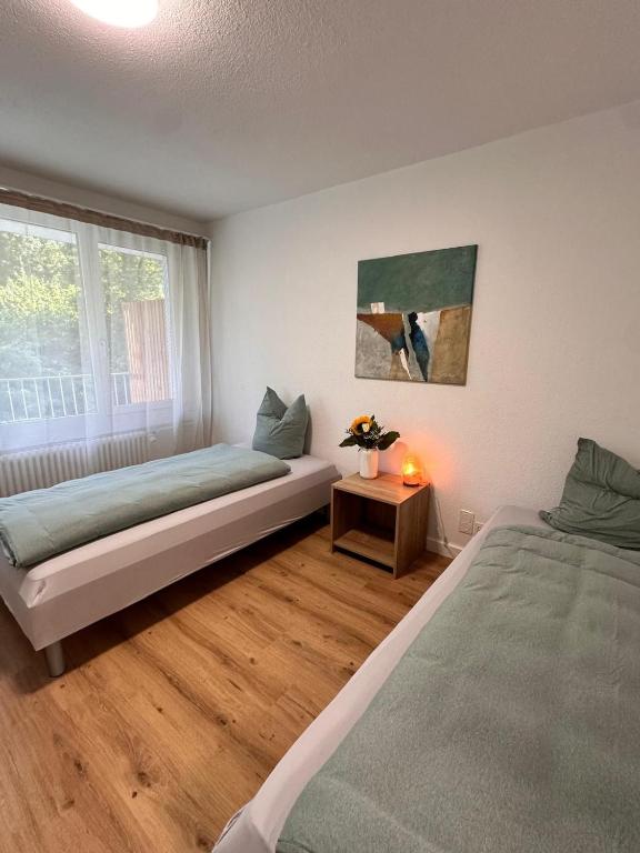 Postel nebo postele na pokoji v ubytování Business Hotel Riverside