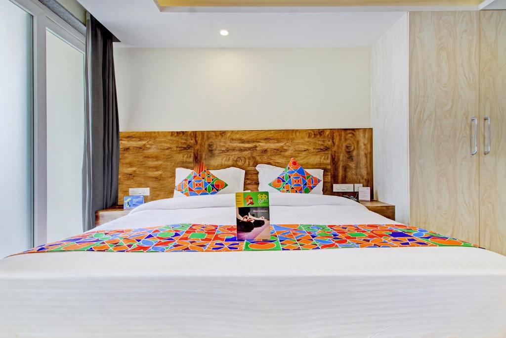 Postel nebo postele na pokoji v ubytování FabHotel Soft Petals