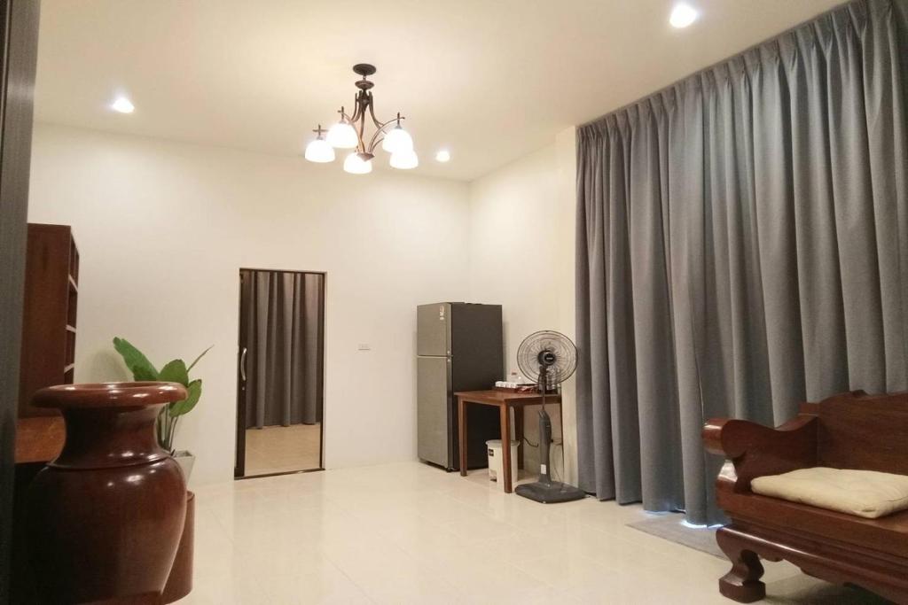 Posezení v ubytování Sanaepatan Home Resort - เสน่ห์ป่าตาล โฮม รีสอร์ต
