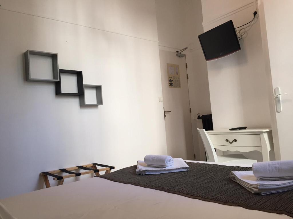 Postel nebo postele na pokoji v ubytování Hotel Danemark
