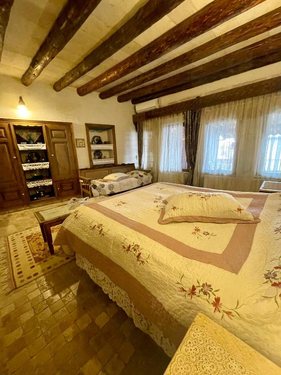 Postel nebo postele na pokoji v ubytování Sofa Hotel