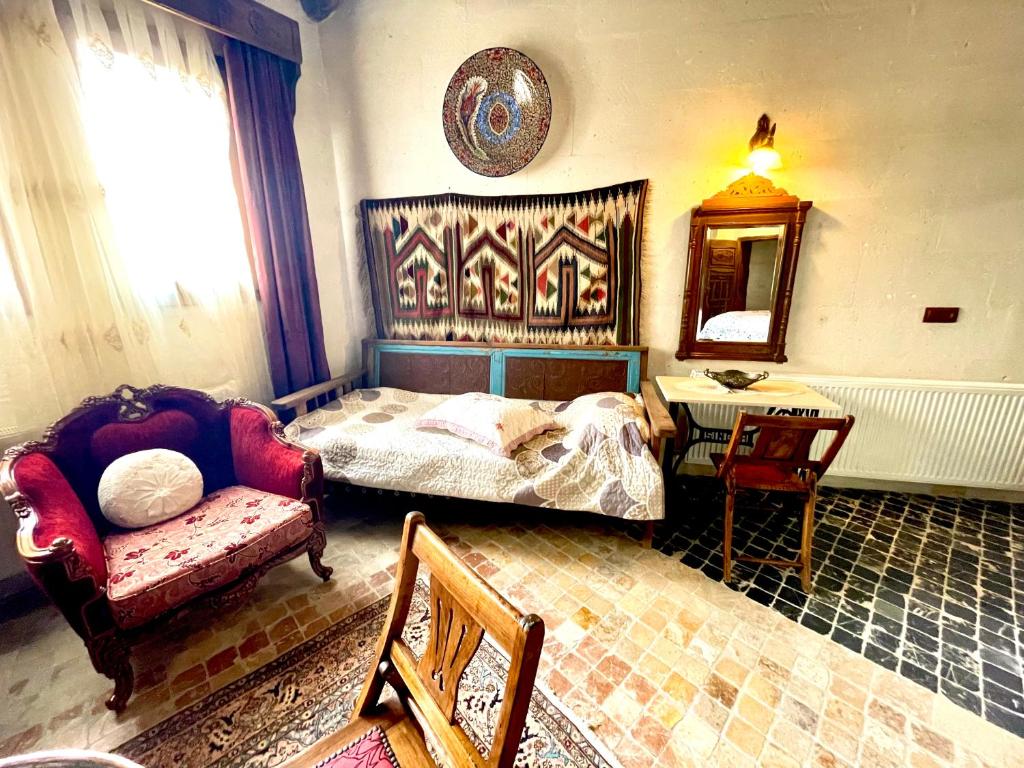 Postel nebo postele na pokoji v ubytování Sofa Hotel