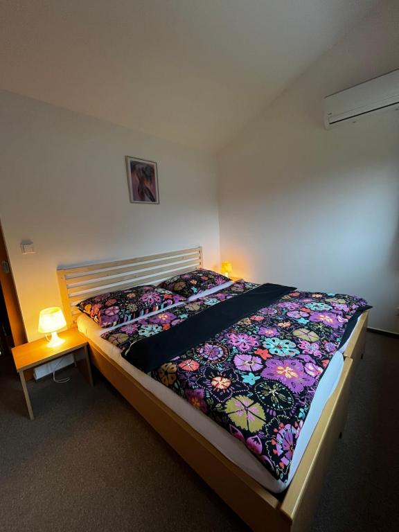 Postel nebo postele na pokoji v ubytování Apartmany Resort
