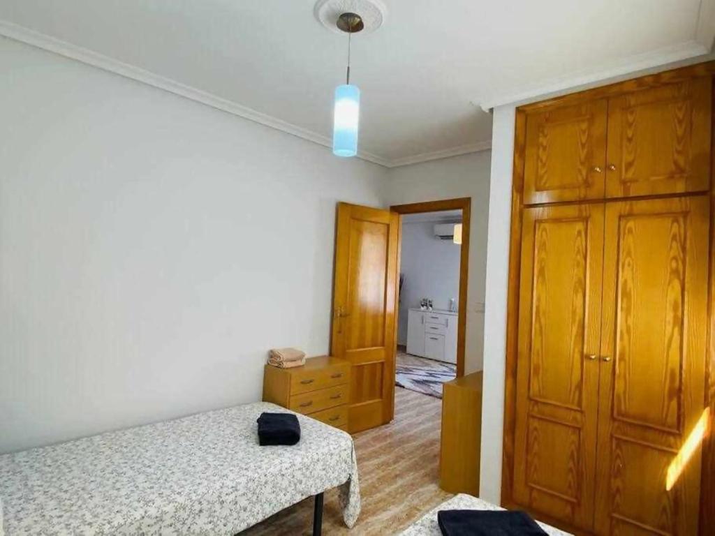 Postel nebo postele na pokoji v ubytování Acogedor apartamento a 200 m de la playa