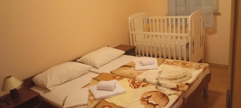 Postel nebo postele na pokoji v ubytování D & J Pansion
