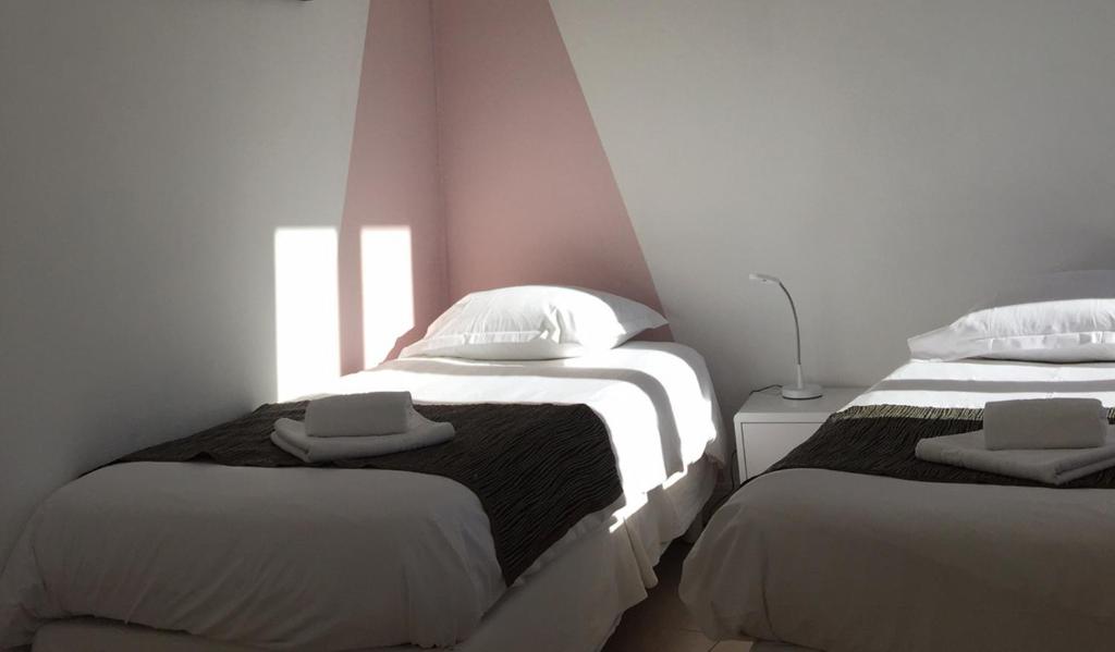 Postel nebo postele na pokoji v ubytování Hotel Danemark