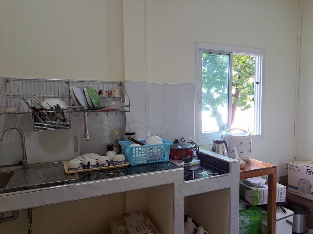 Kuchyň nebo kuchyňský kout v ubytování Lomtalay Resort Trat