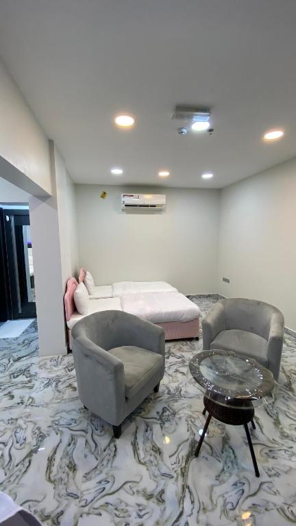مارينا للغرف الفندقية - Habitación Cuádruple Con Baño Compartido