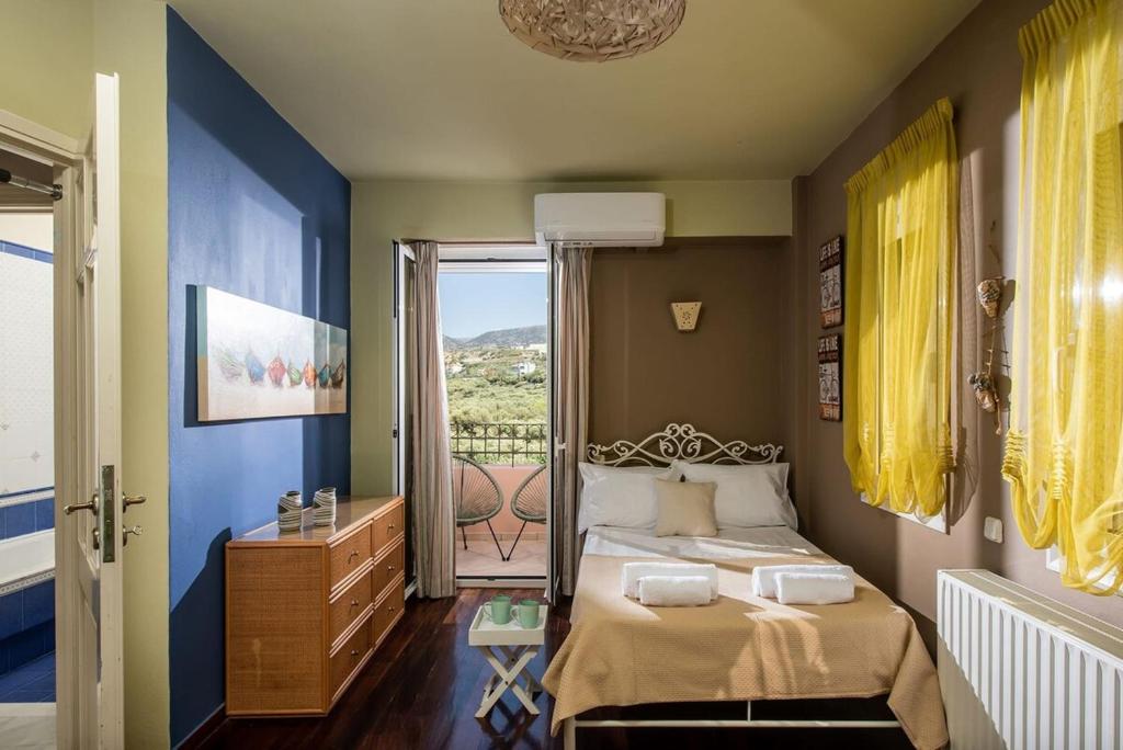 Postel nebo postele na pokoji v ubytování Villa Agriana Countryside