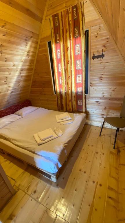 Postel nebo postele na pokoji v ubytování Cottage in Gudauri