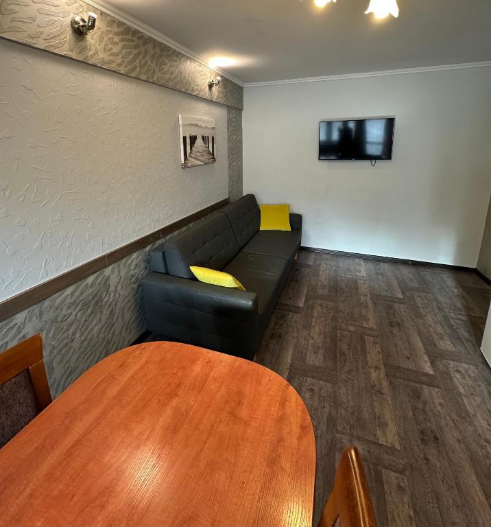 Televízia a/alebo spoločenská miestnosť v ubytovaní APARTAMENT NAD KAMIEŃCZYKIEM II
