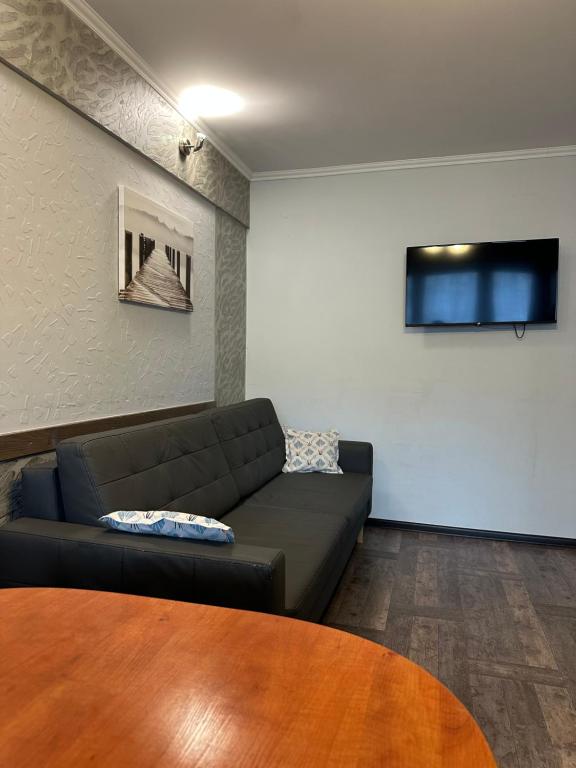 Televízia a/alebo spoločenská miestnosť v ubytovaní APARTAMENT NAD KAMIEŃCZYKIEM II