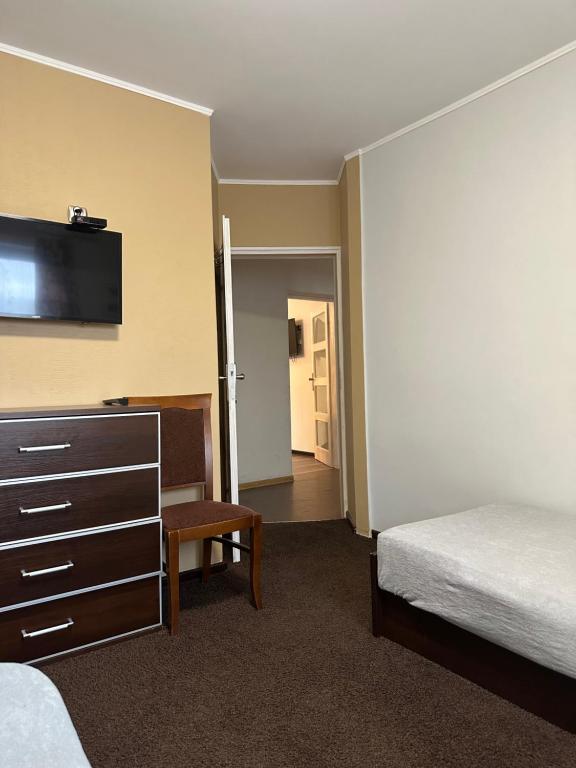 Posteľ alebo postele v izbe v ubytovaní APARTAMENT NAD KAMIEŃCZYKIEM II