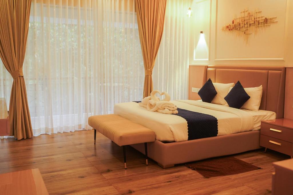 Postel nebo postele na pokoji v ubytování Hunters Hideout Resort