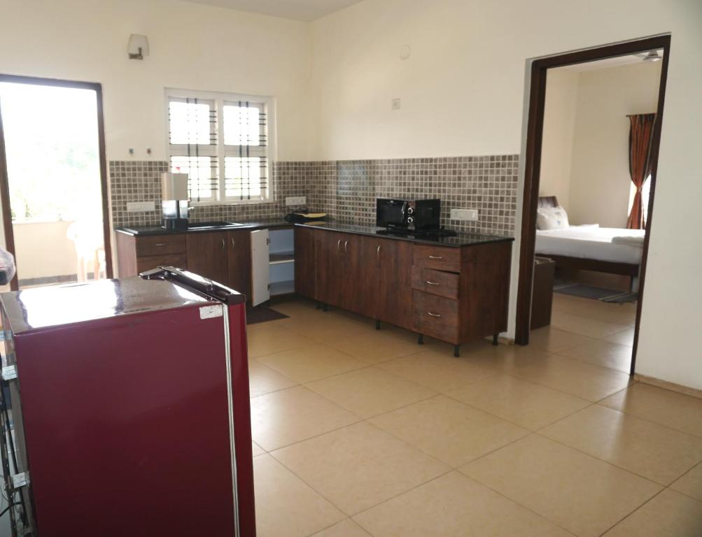 Kuchyň nebo kuchyňský kout v ubytování Stays 42 - Oleander Suites Coorg