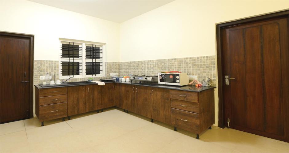Kuchyň nebo kuchyňský kout v ubytování Stays 42 - Oleander Suites Coorg