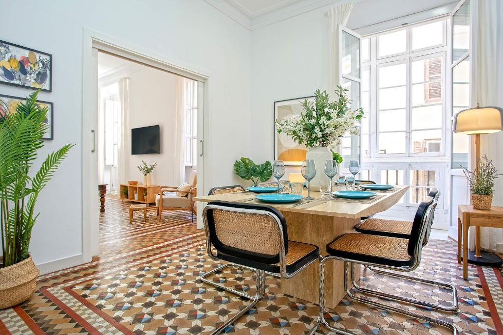 Televízia a/alebo spoločenská miestnosť v ubytovaní Genteel Home Larios