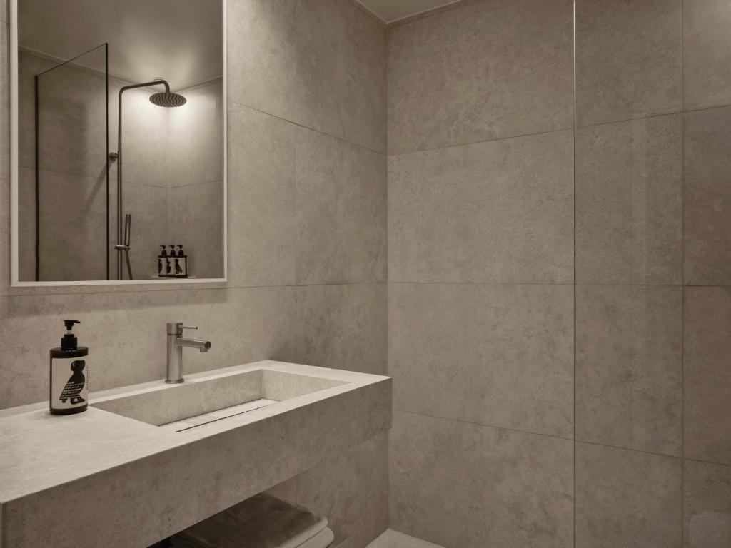 Koupelna v ubytování Doryssa Method Hotel