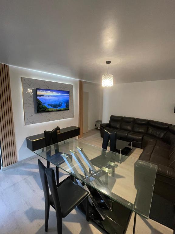 Posezení v ubytování Appartement 3 pièces à 5 minutes de la gare de Creil
