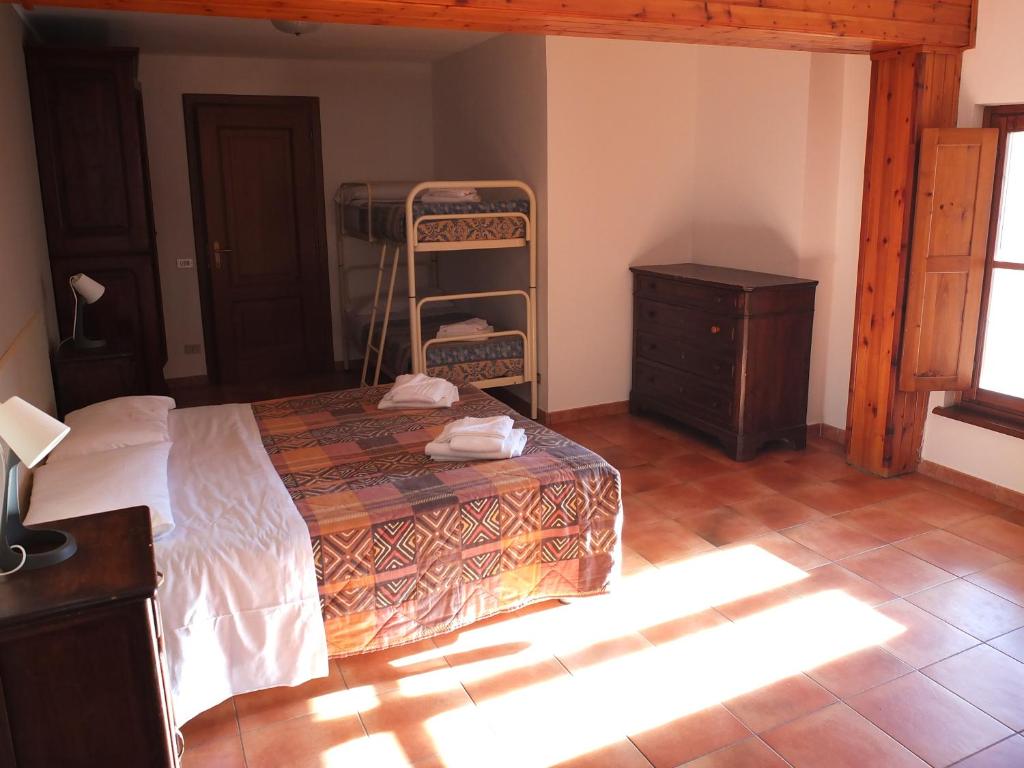 Postel nebo postele na pokoji v ubytování Casa Guigas