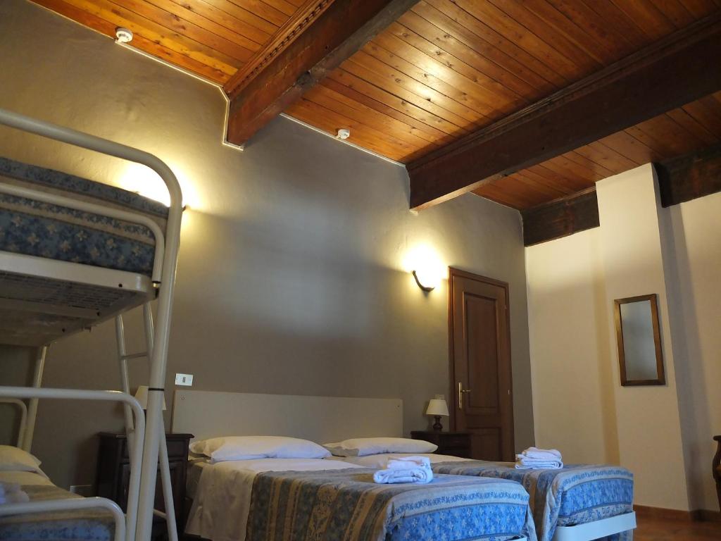 Postel nebo postele na pokoji v ubytování Casa Guigas