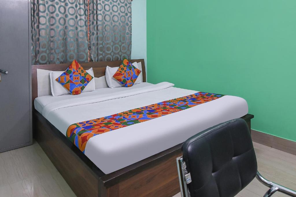 Postel nebo postele na pokoji v ubytování FabHotel Vicky
