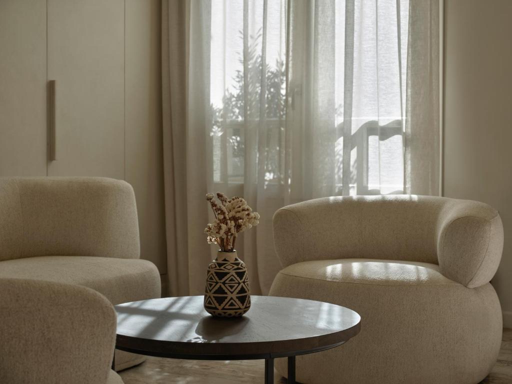 Posezení v ubytování Doryssa Method Hotel