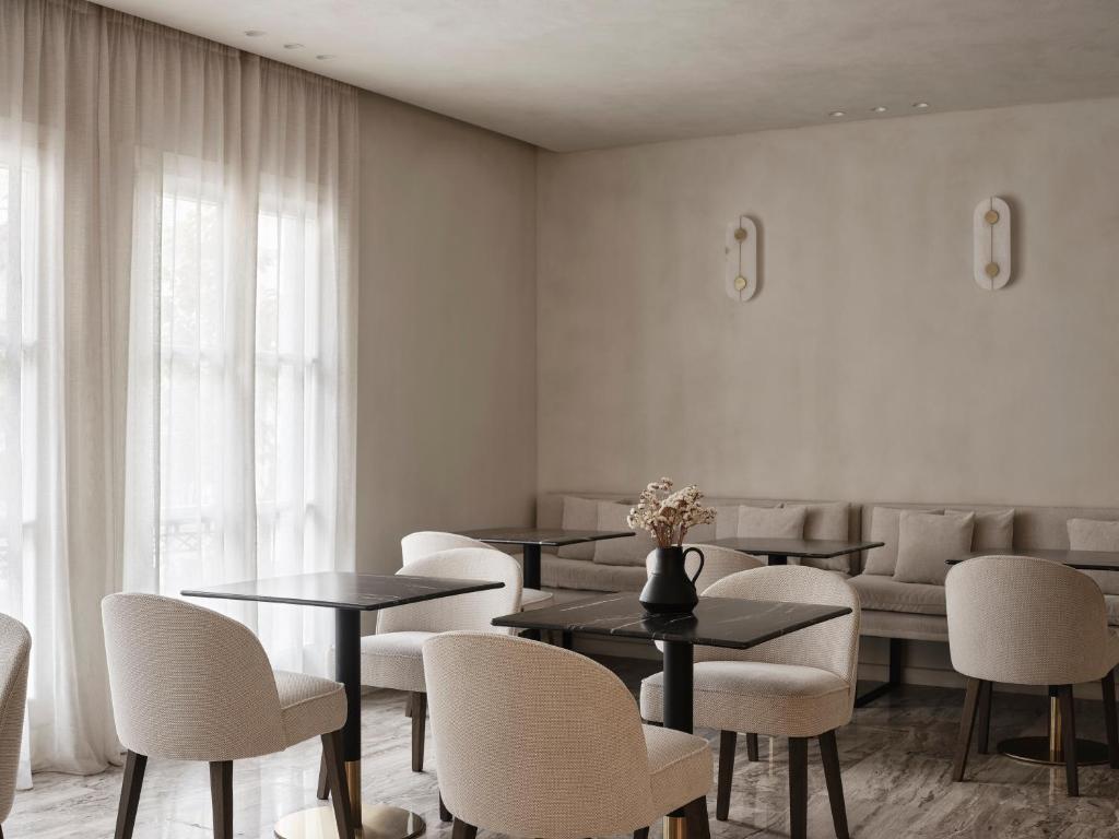 Posezení v ubytování Doryssa Method Hotel