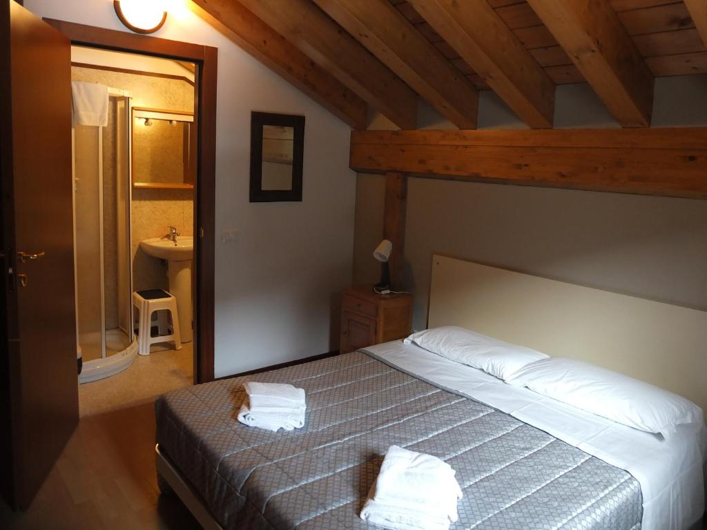 Postel nebo postele na pokoji v ubytování Casa Guigas