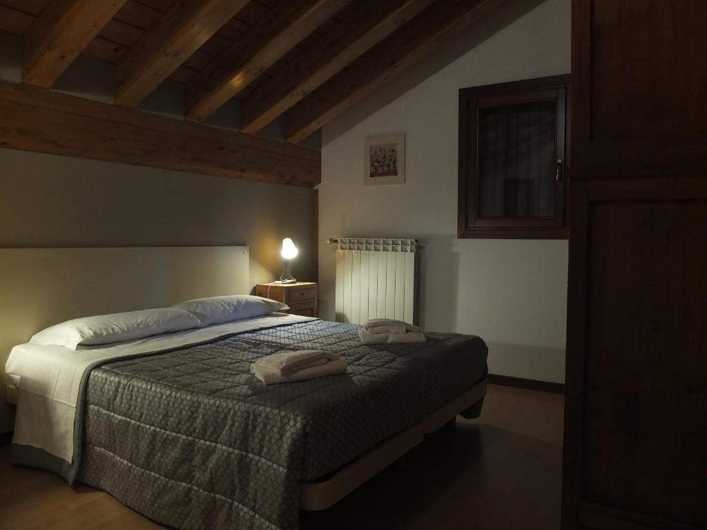 Postel nebo postele na pokoji v ubytování Casa Guigas