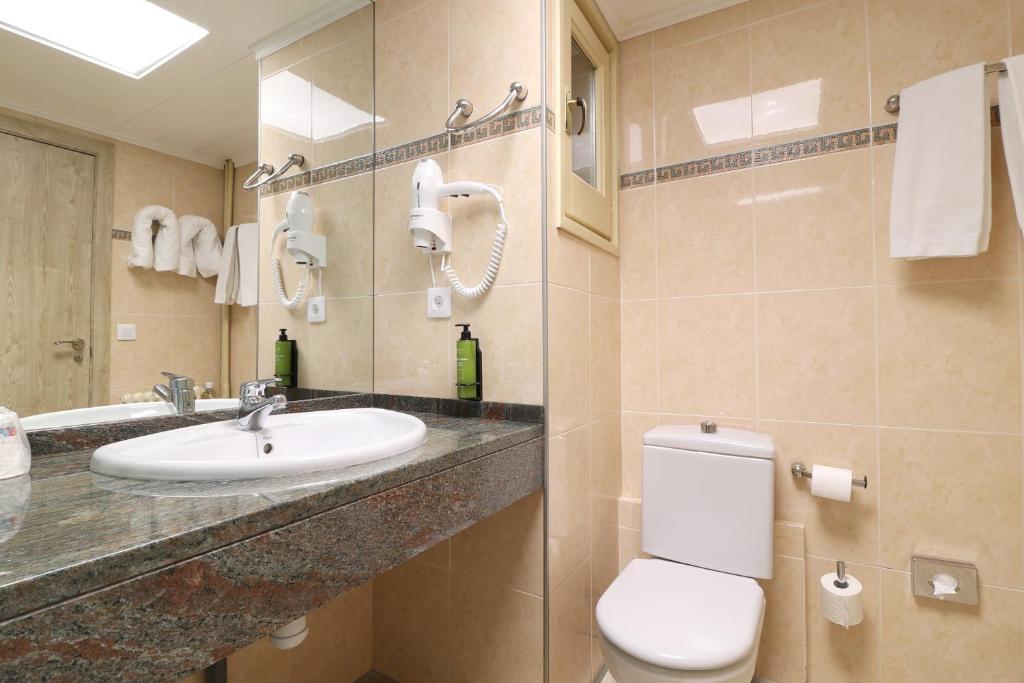 Koupelna v ubytování Hotel Blu Aran