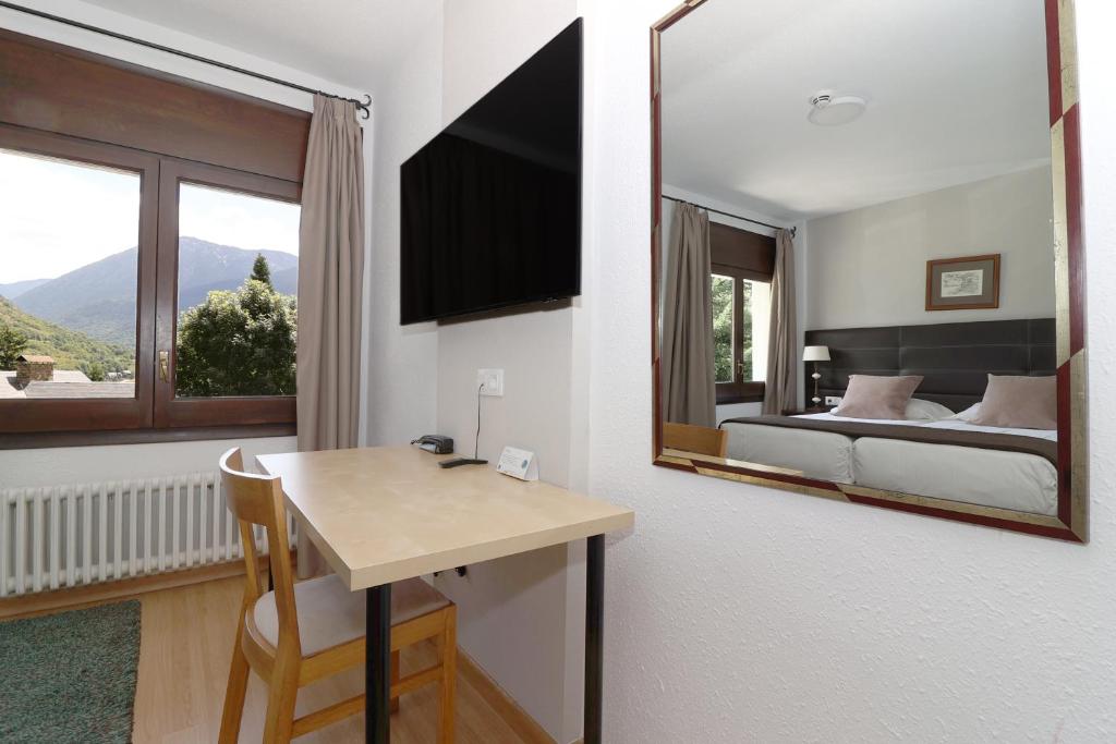 TV a/nebo společenská místnost v ubytování Hotel Blu Aran