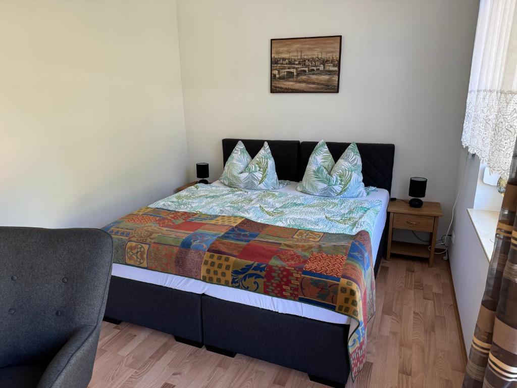 Postel nebo postele na pokoji v ubytování Bed & Breakfast am Waldgürtel