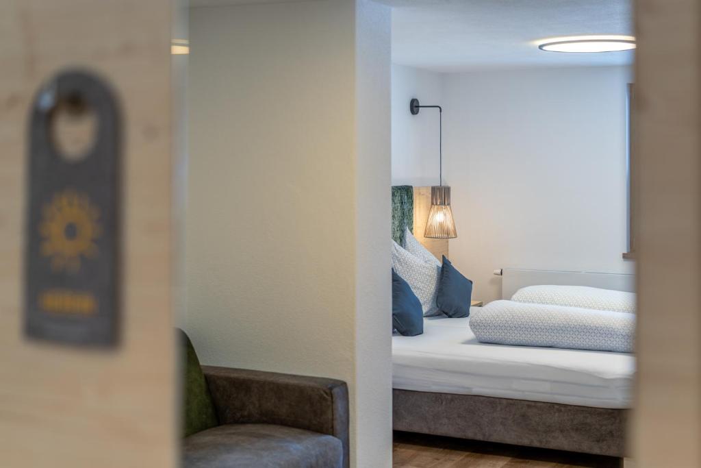 Postel nebo postele na pokoji v ubytování Haus Gstrein