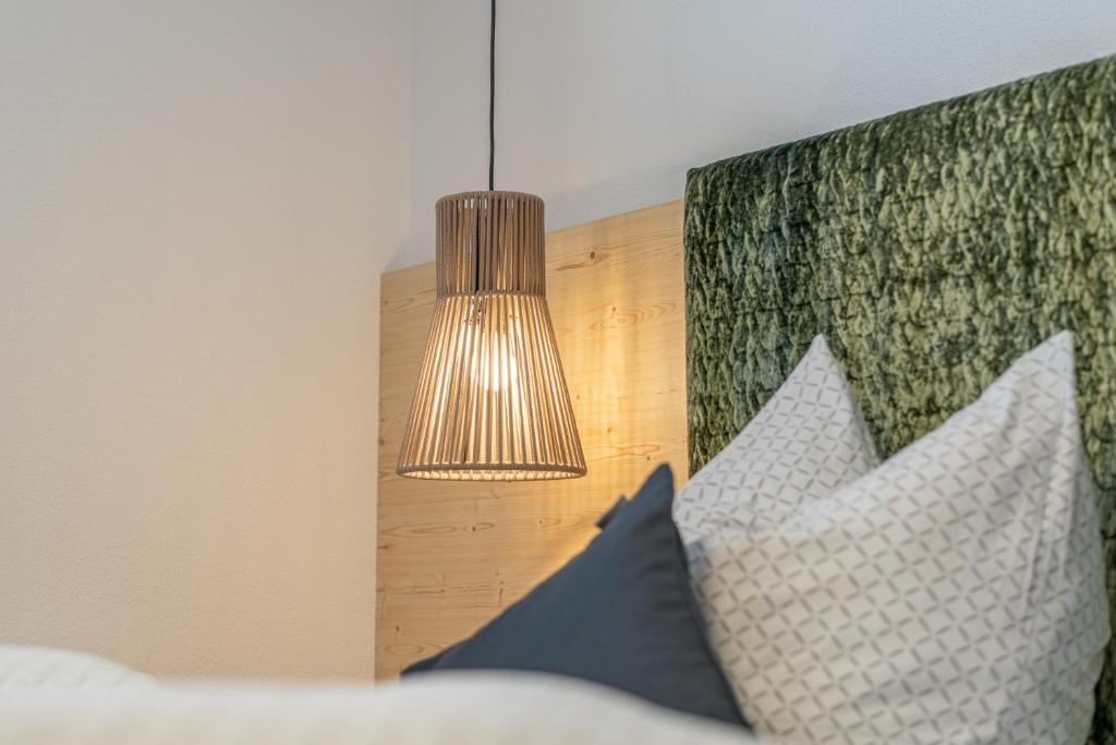 Postel nebo postele na pokoji v ubytování Haus Gstrein