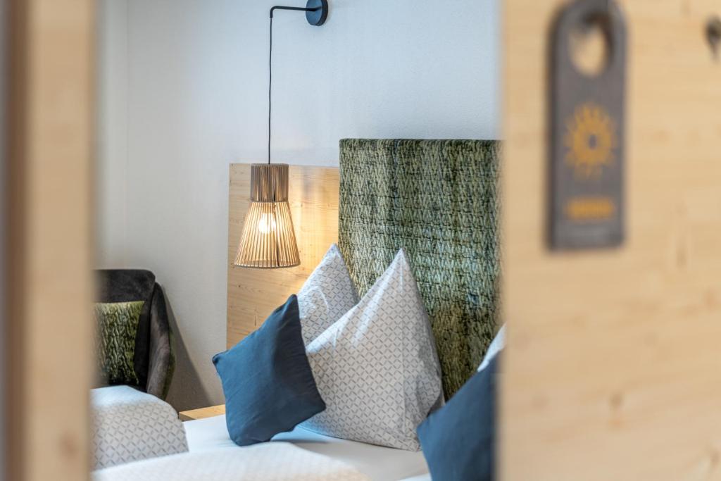 Postel nebo postele na pokoji v ubytování Haus Gstrein