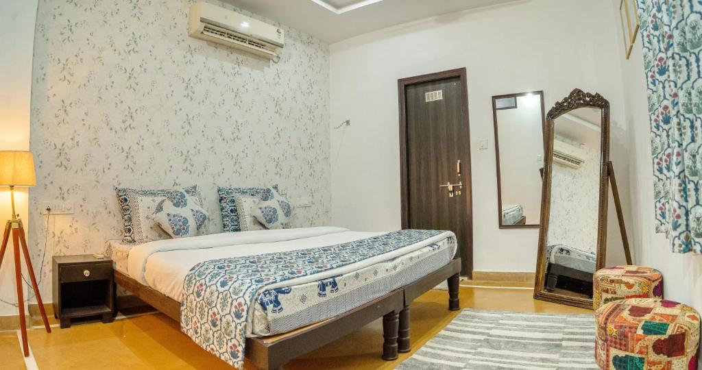 Ένα ή περισσότερα κρεβάτια σε δωμάτιο στο Footprint Hostel Udaipur