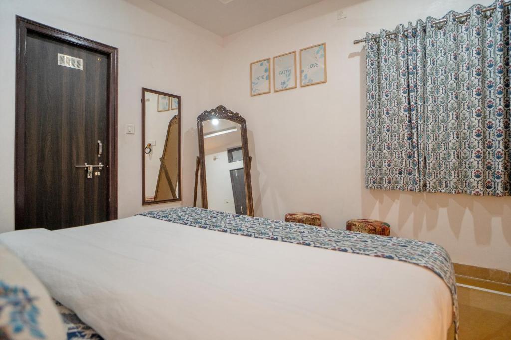 Ένα ή περισσότερα κρεβάτια σε δωμάτιο στο Footprint Hostel Udaipur