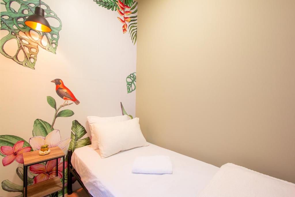 Letto o letti in una camera di Parceros Med Hostel