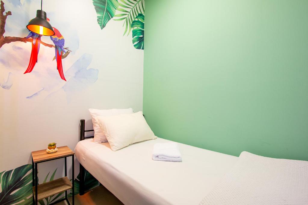 Letto o letti in una camera di Parceros Med Hostel