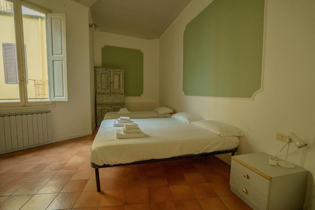 Posteľ alebo postele v izbe v ubytovaní Tranquil Suite Near Museums and Train Station