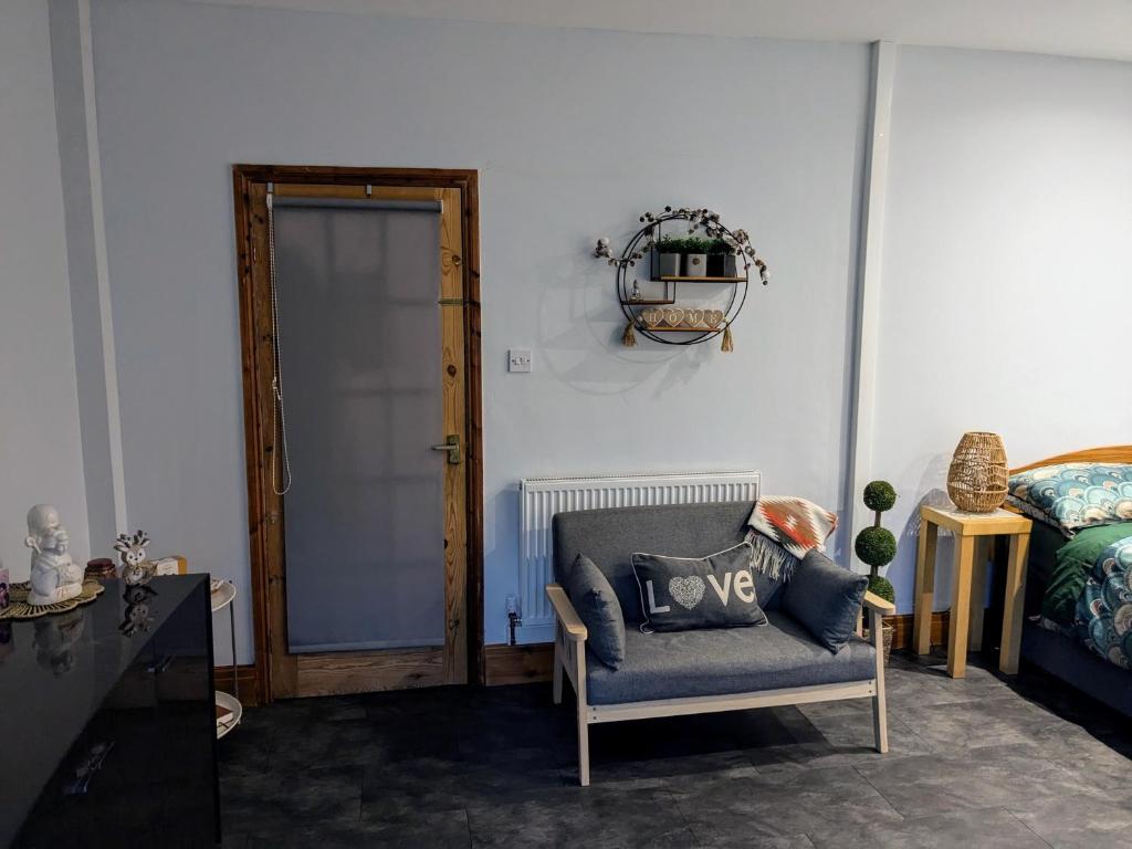 Et opholdsområde på Butterfly Cottage