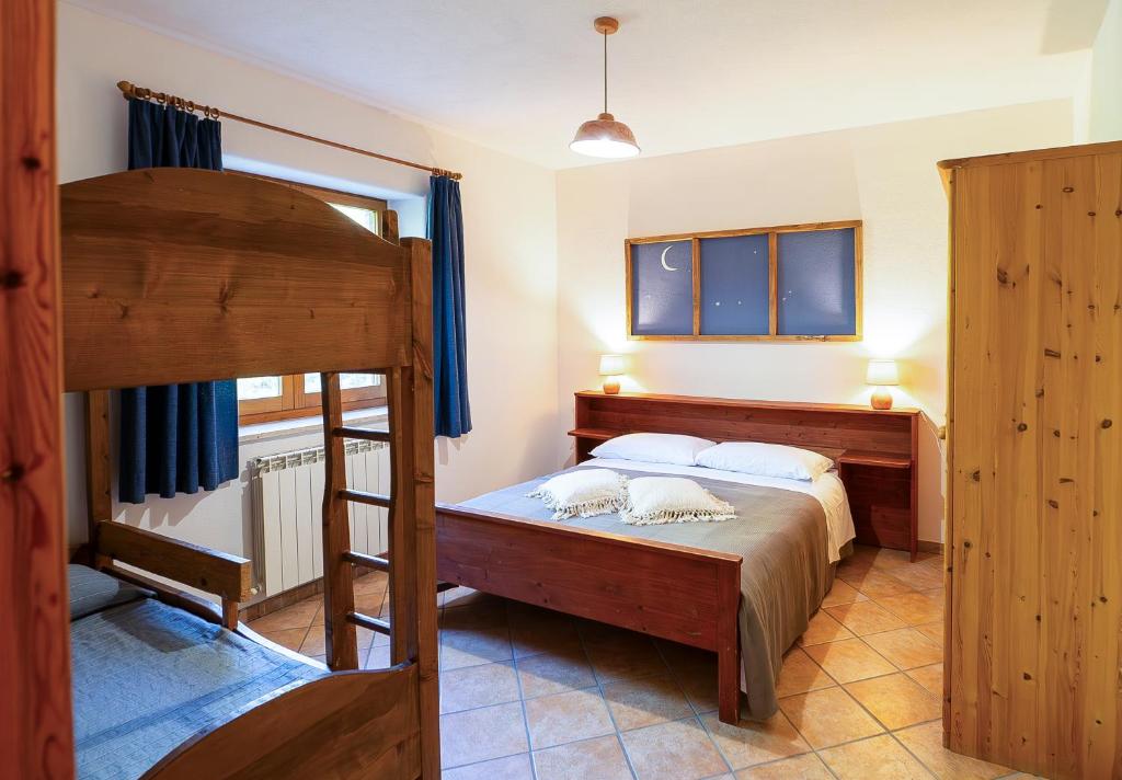 Łóżko lub łóżka w pokoju w obiekcie Agriturismo Fattoria Walden