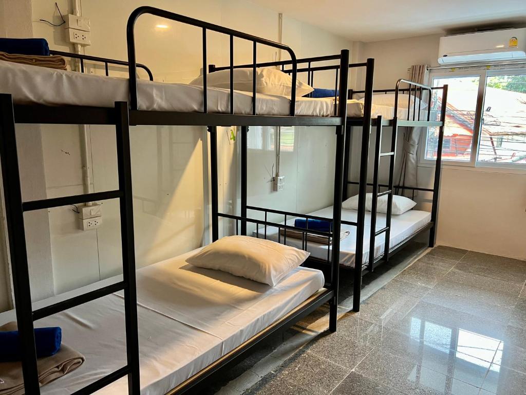 Postel nebo postele na pokoji v ubytování YP Hostel
