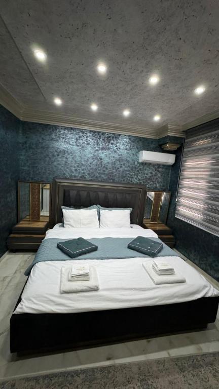 Postel nebo postele na pokoji v ubytování Hotel Premium
